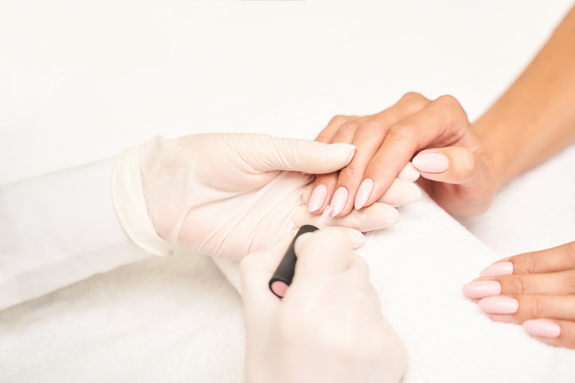 Woman Getting a Manicure      